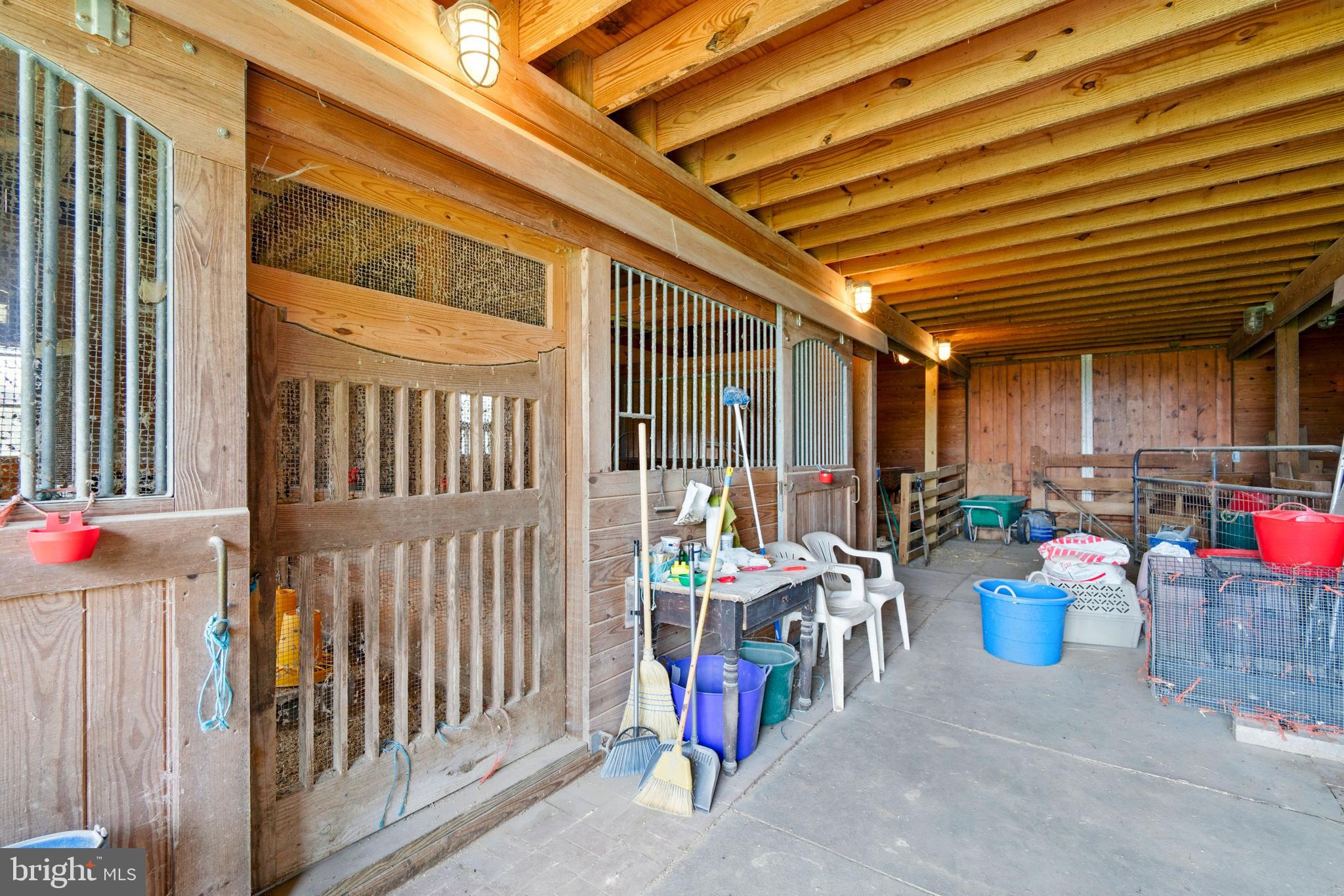 300 Hickory Lane Chestertown, MD 21620 - Photo 20 of 30 a view of a patio with table and chairs and a potted plant