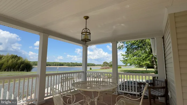 a view of a balcony with chairs