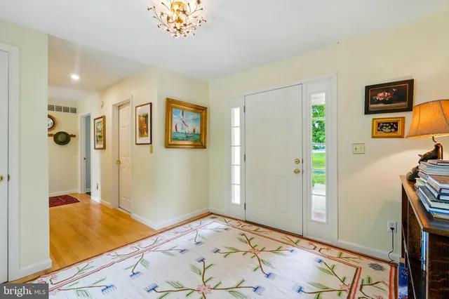 a bedroom with a bed and a view of bathroom