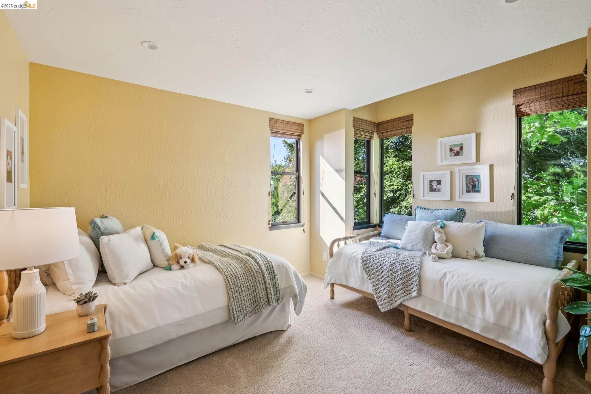 576 Vistamont Avenue Berkeley, CA 94708 - Photo 24 of 33 Carpeted room featuring multiple windows with wood-tone blinds, a textured wall finish, and recessed ceiling lighting