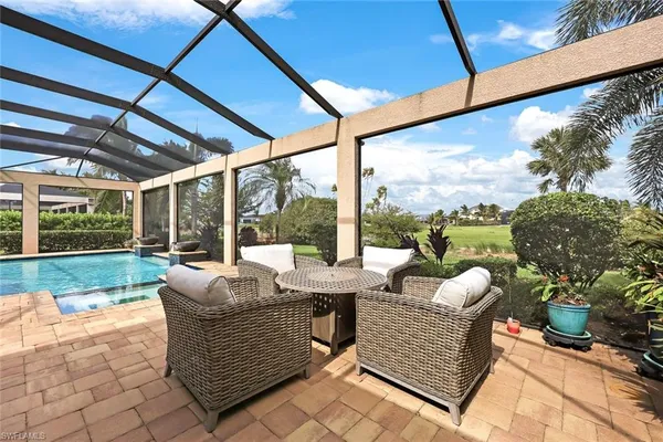 a outdoor living space with furniture and garden view