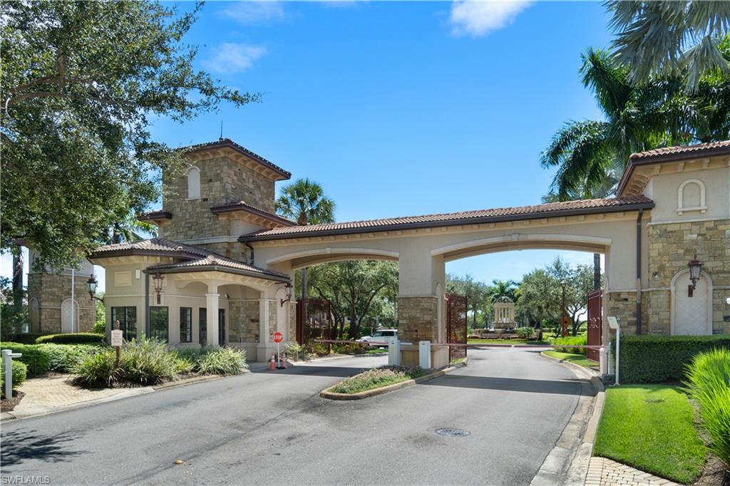 9856 Corso Bello Drive Naples, FL 34113 - Photo 34 of 50 front view of a house with a porch