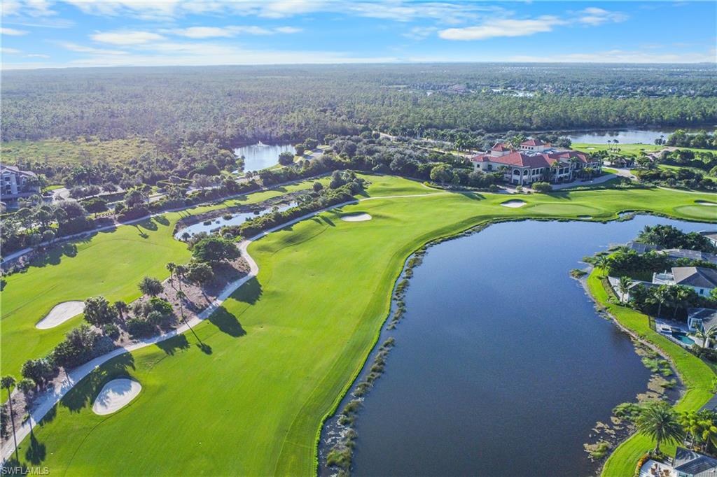 9856 Corso Bello Drive Naples, FL 34113 - Photo 48 of 50 an aerial view of a houses with a yard