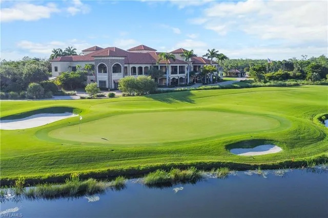 a view of a golf course with a swimming pool