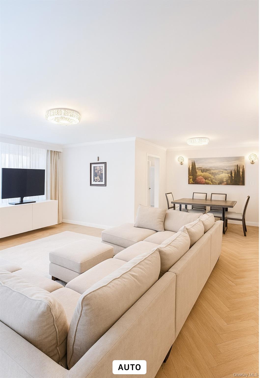 150-40 Jewel Avenue, Unit 66B Queens, NY 11367 - Photo 2 of 11 a living room with furniture and a flat screen tv