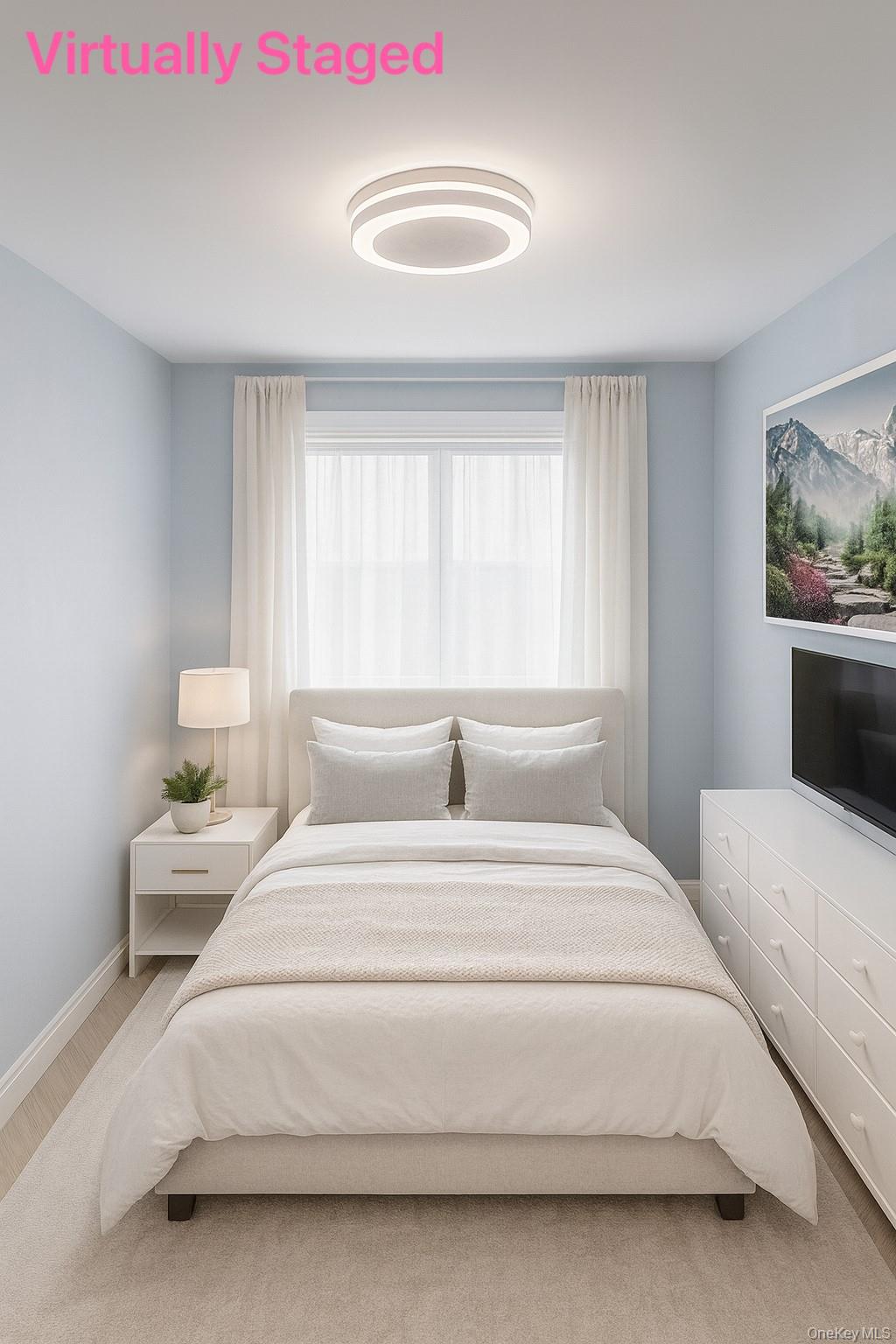 150-40 Jewel Avenue, Unit 66B Queens, NY 11367 - Photo 3 of 11 a bedroom with a bed and a chandelier