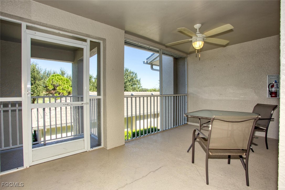 10371 McArthur Palms Lane, Unit 2823 Fort Myers, FL 33966 - Photo 24 of 48 a view of a livingroom with furniture and a window