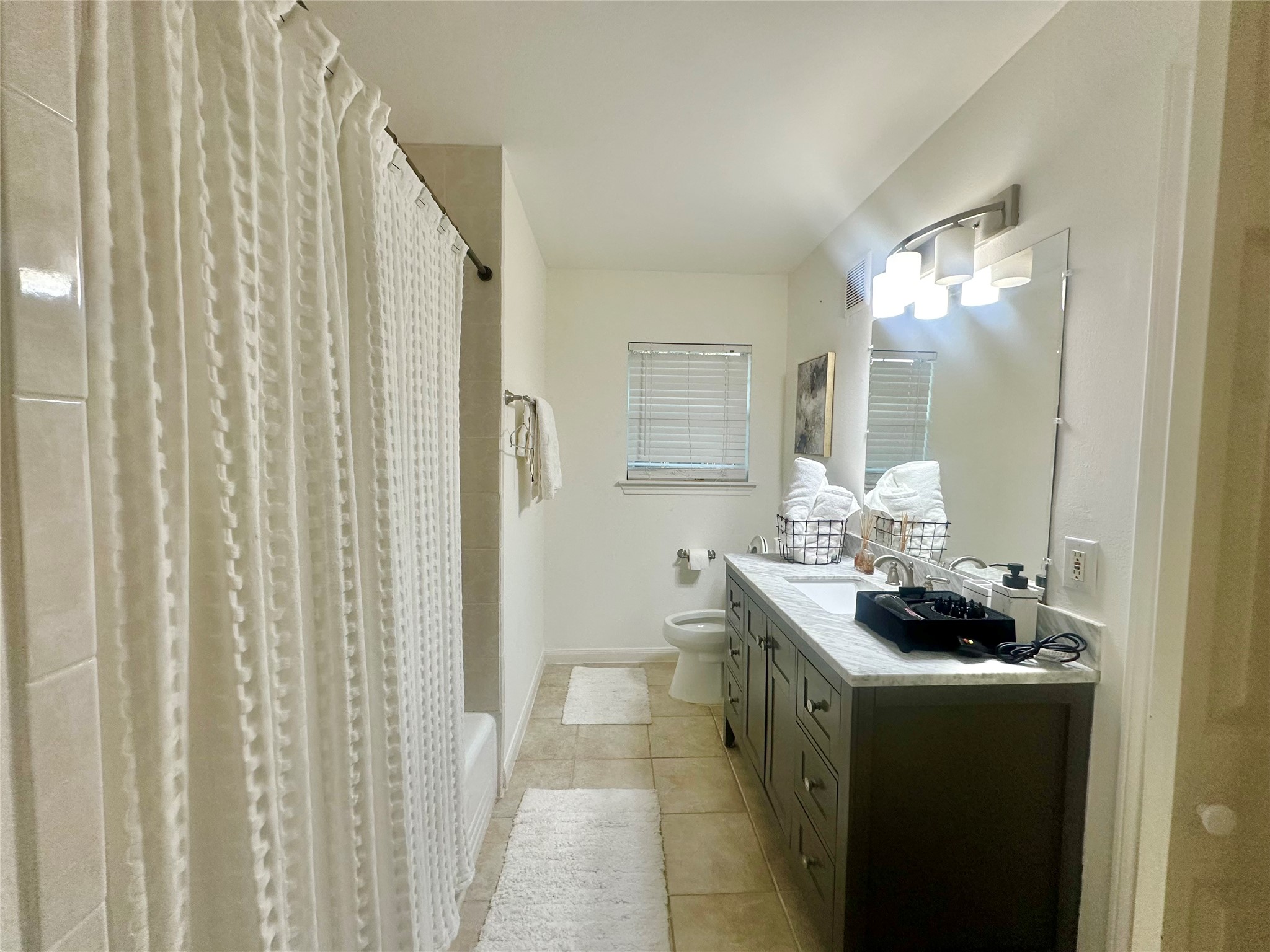 5329 Pagewood Lane Houston, TX 77056 - Photo 15 of 18 a kitchen with a sink and cabinets