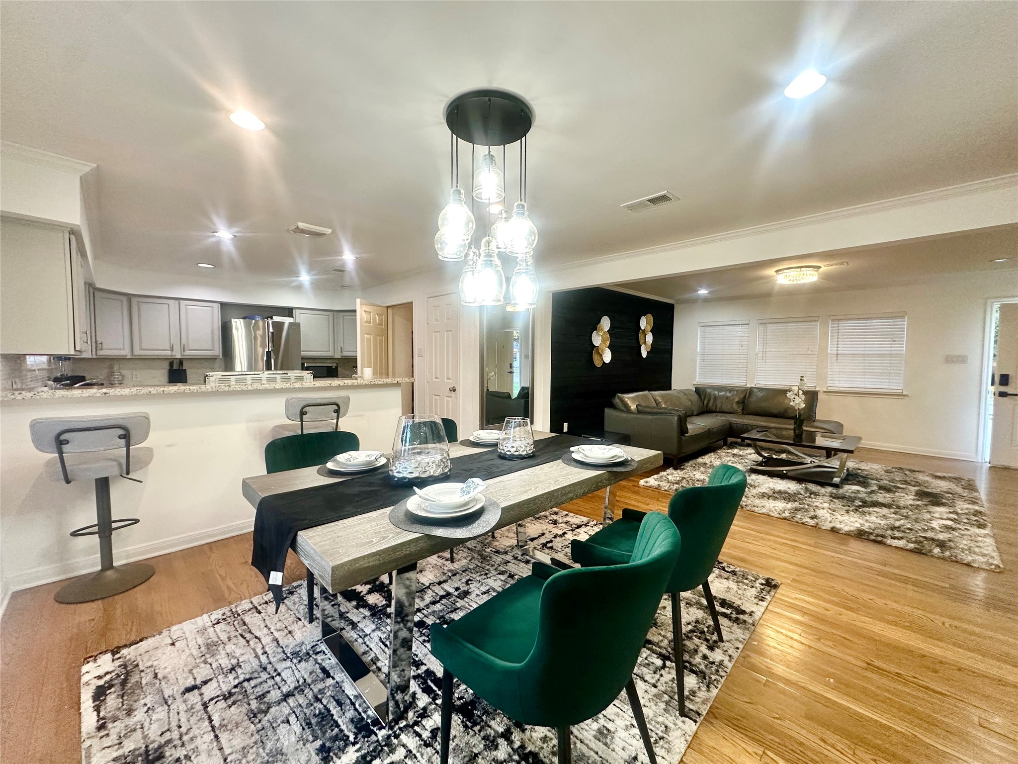 5329 Pagewood Lane Houston, TX 77056 - Photo 5 of 18 a living room with lots of furniture and kitchen view