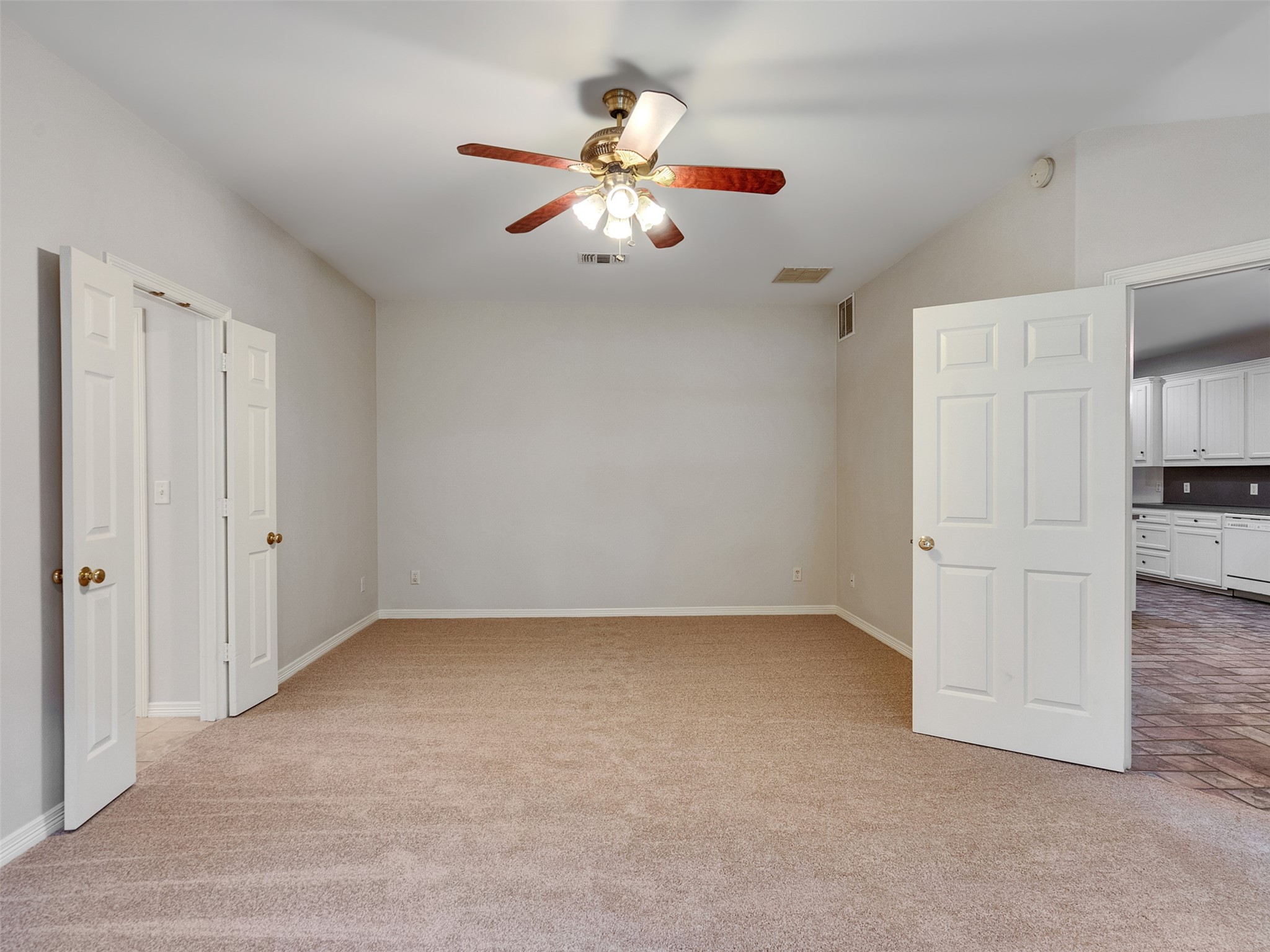 195 Coral Gables Trinity, TX 75862 - Photo 20 of 50 an empty room with closet and windows
