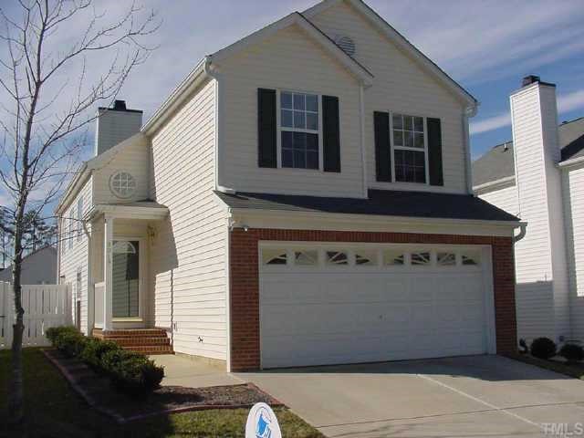 9019 Shallcross Way Raleigh, NC 27617 - Photo 1 of 1 a front view of a house with a yard