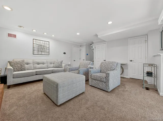 a big room with closet and windows