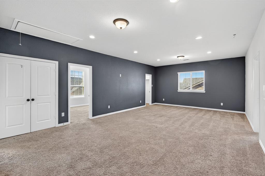 2815 Long Slope Road Arlington, TX 76001 - Photo 23 of 34 a view of an empty room with a window