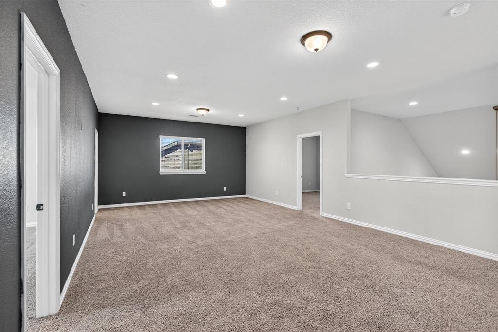 2815 Long Slope Road Arlington, TX 76001 - Photo 24 of 34 a view of an empty room and a window