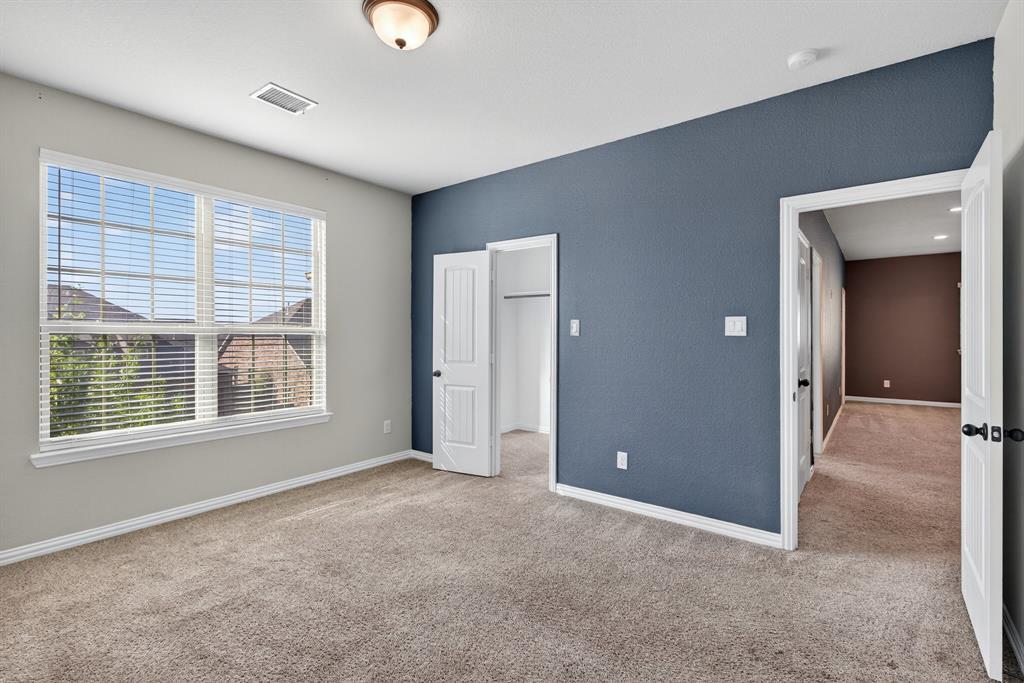 2815 Long Slope Road Arlington, TX 76001 - Photo 28 of 34 a view of an empty room with a window