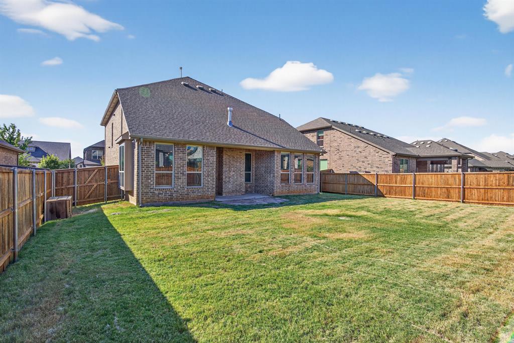 2815 Long Slope Road Arlington, TX 76001 - Photo 32 of 34 a view of a house with backyard and porch
