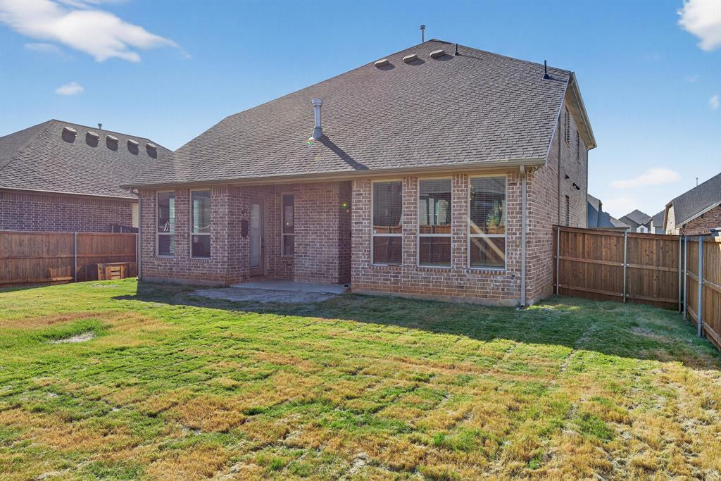 2815 Long Slope Road Arlington, TX 76001 - Photo 34 of 34 a view of a house with a yard