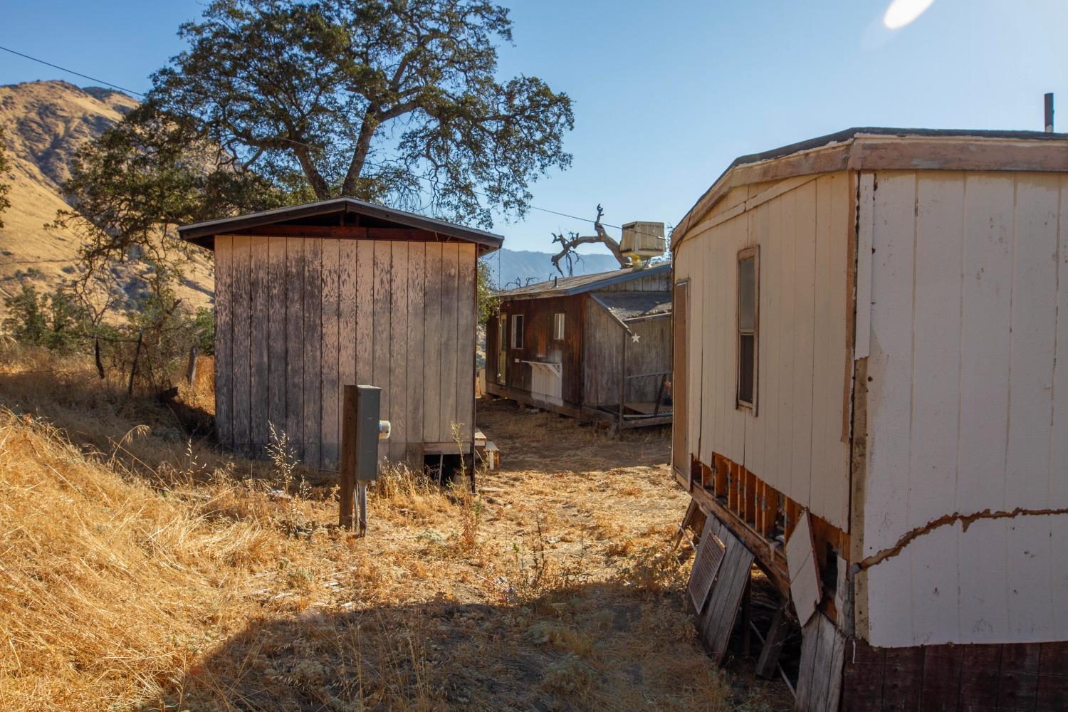 893 Winter Road Squaw Valley, CA 93675 - Photo 27 of 42 a view of a house with backyard and sitting area