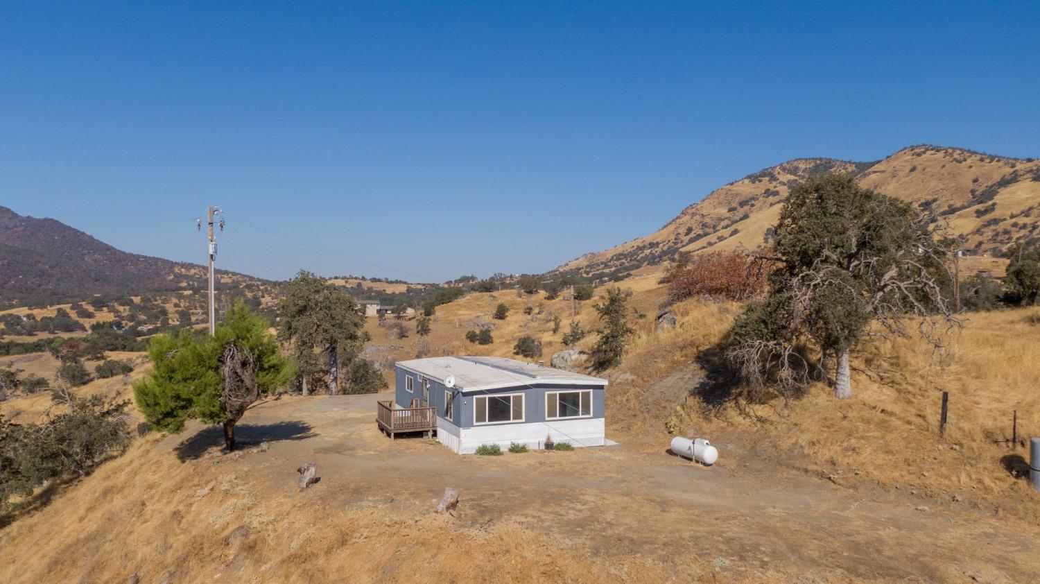 893 Winter Road Squaw Valley, CA 93675 - Photo 9 of 42 a view of a house with a yard