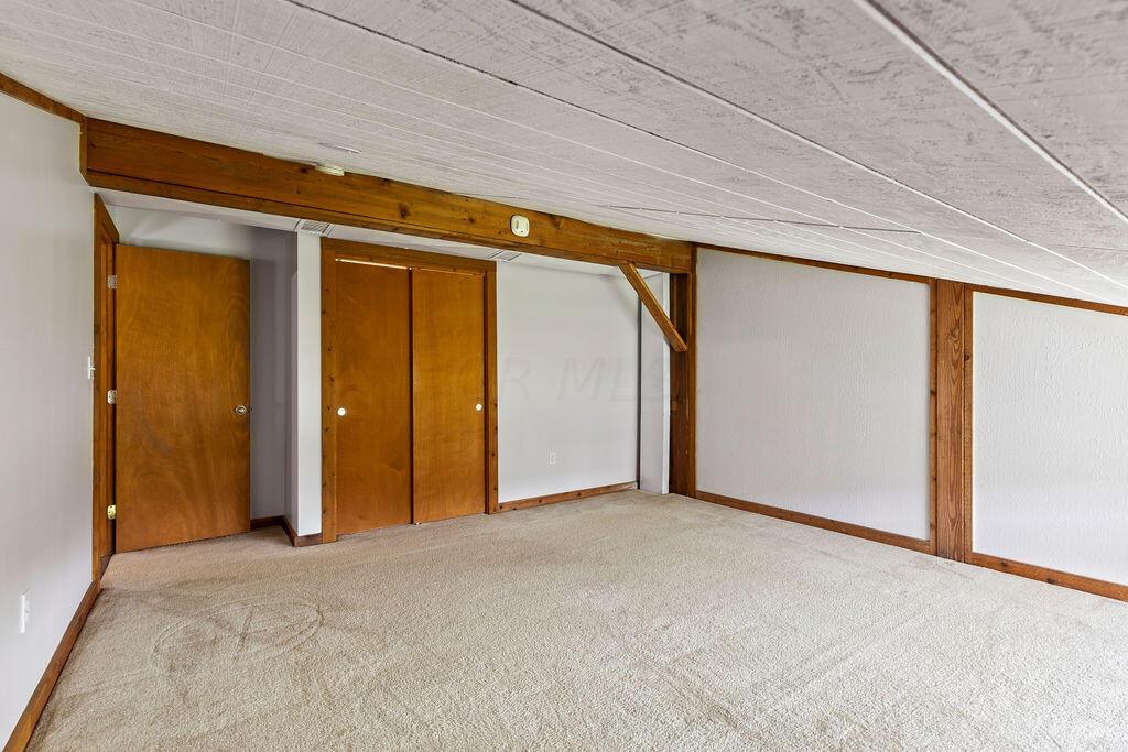 10389 Center Village Road, Unit A Galena, OH 43021 - Photo 31 of 39 bedroom 2 opposite view with closet
