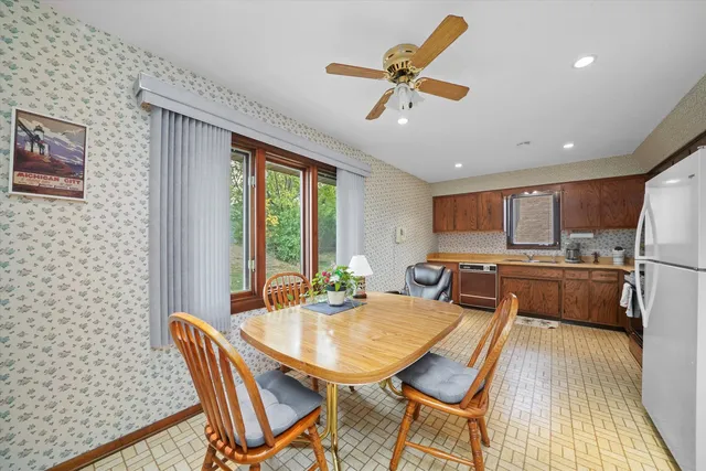 a bed room with a bed and a television