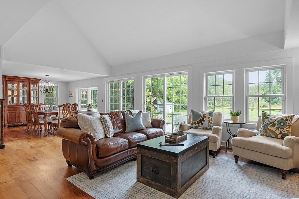 286 Lexington Road Concord, MA 01742 - Photo 12 of 41 a living room with furniture and a large window