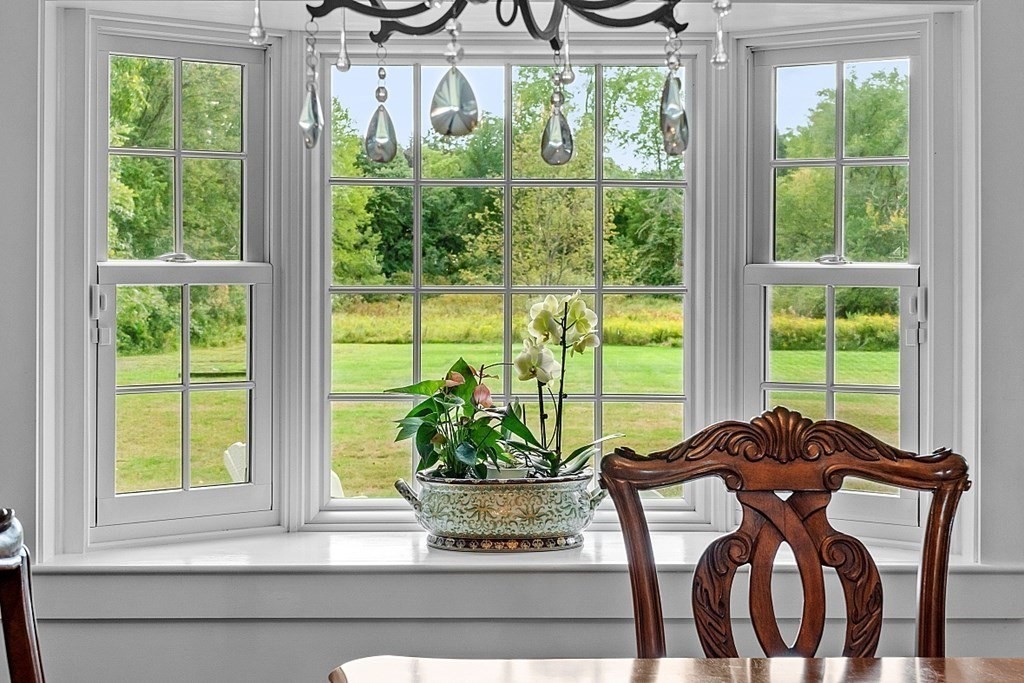 286 Lexington Road Concord, MA 01742 - Photo 14 of 41 a view of a dining room with furniture window and outside view
