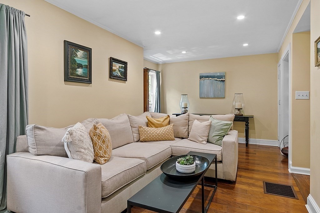 286 Lexington Road Concord, MA 01742 - Photo 22 of 41 a living room with furniture and wooden floor