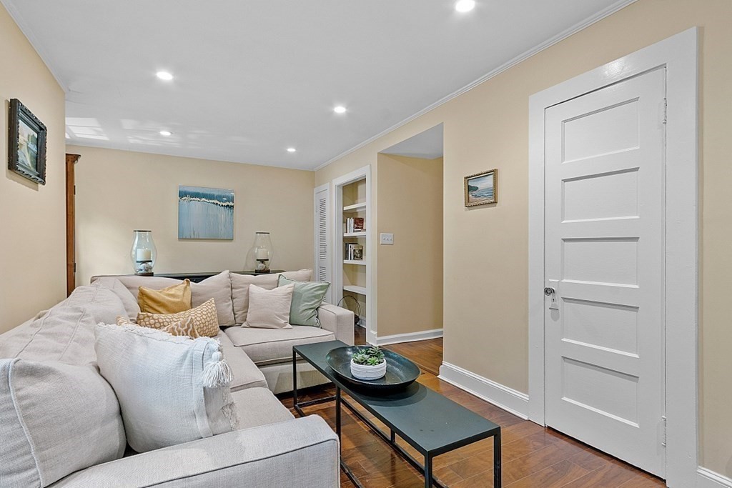 286 Lexington Road Concord, MA 01742 - Photo 23 of 41 a living room with furniture and wooden floor