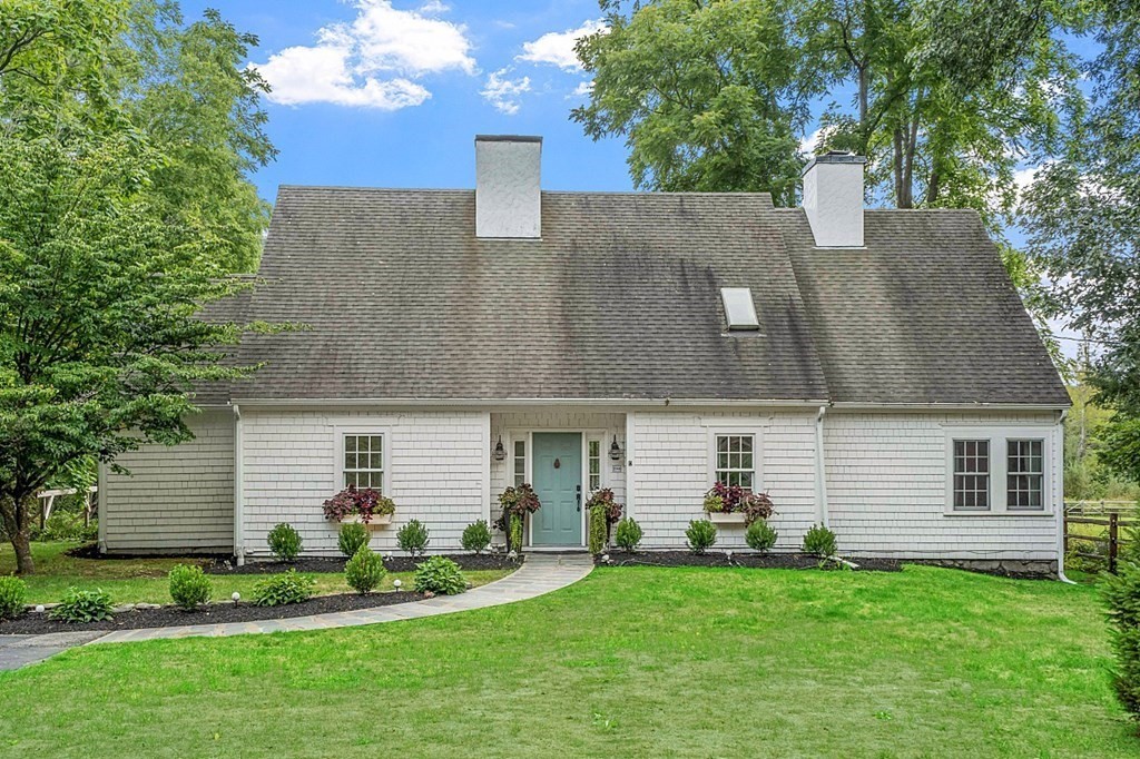 286 Lexington Road Concord, MA 01742 - Photo 3 of 41 front view of a house with a yard