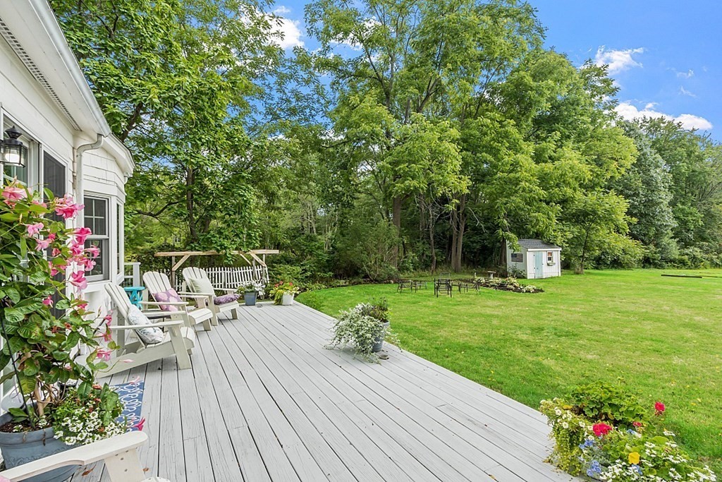 286 Lexington Road Concord, MA 01742 - Photo 37 of 41 a view of a chair and tables front of the house