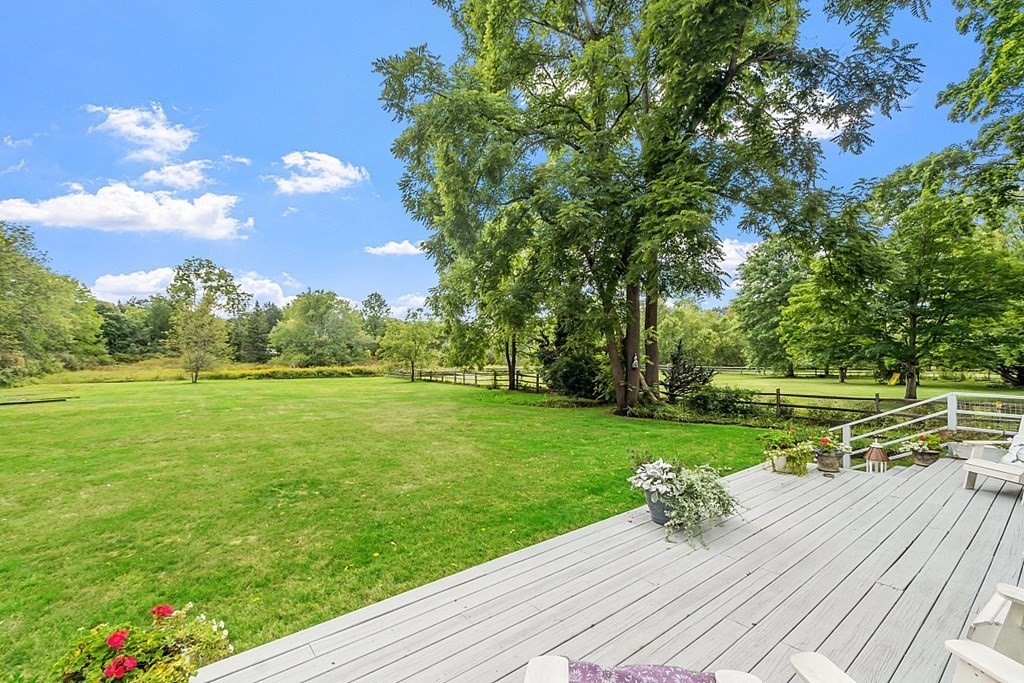 286 Lexington Road Concord, MA 01742 - Photo 38 of 41 a view of a deck and an outdoor space
