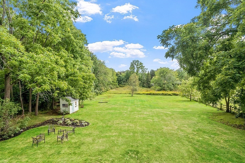 286 Lexington Road Concord, MA 01742 - Photo 5 of 41 a view of a big yard