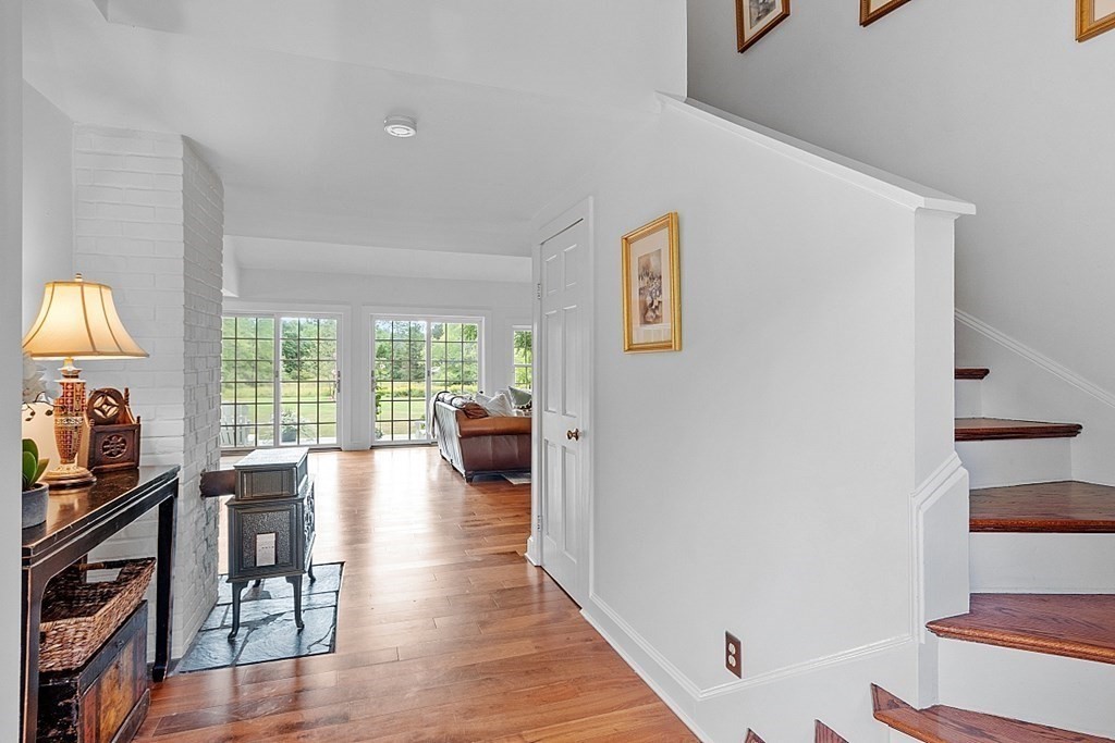286 Lexington Road Concord, MA 01742 - Photo 6 of 41 a living room with furniture and a large window