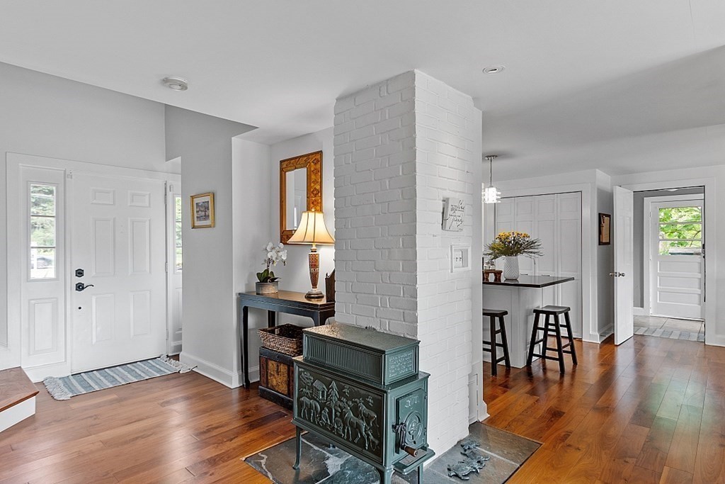 286 Lexington Road Concord, MA 01742 - Photo 7 of 41 a living room with furniture and wooden floor