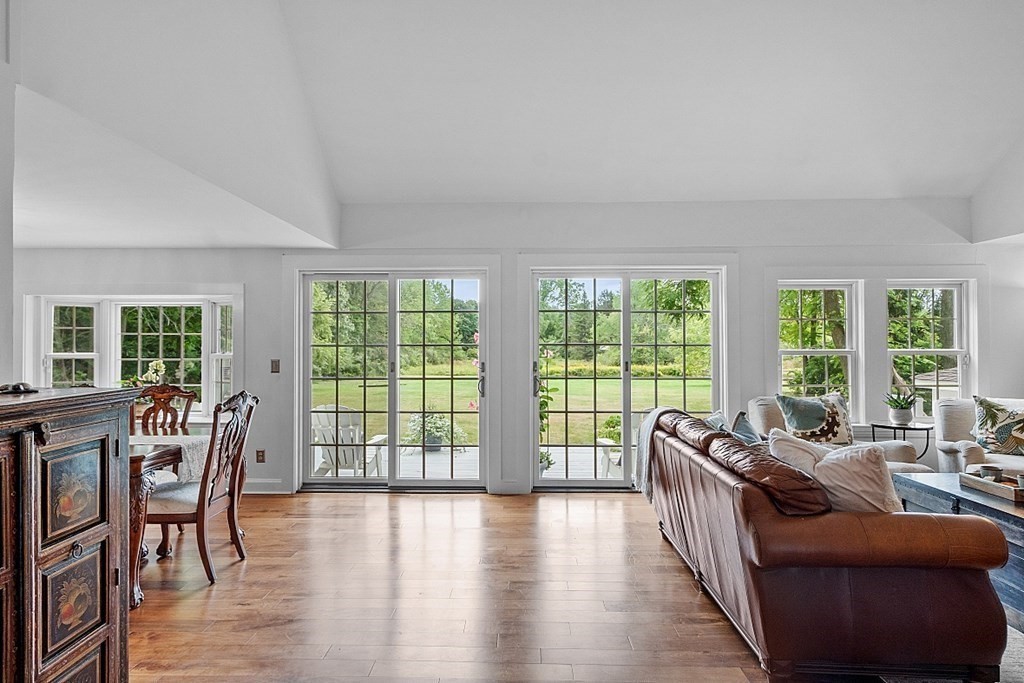 286 Lexington Road Concord, MA 01742 - Photo 8 of 41 a living room with furniture and a large window