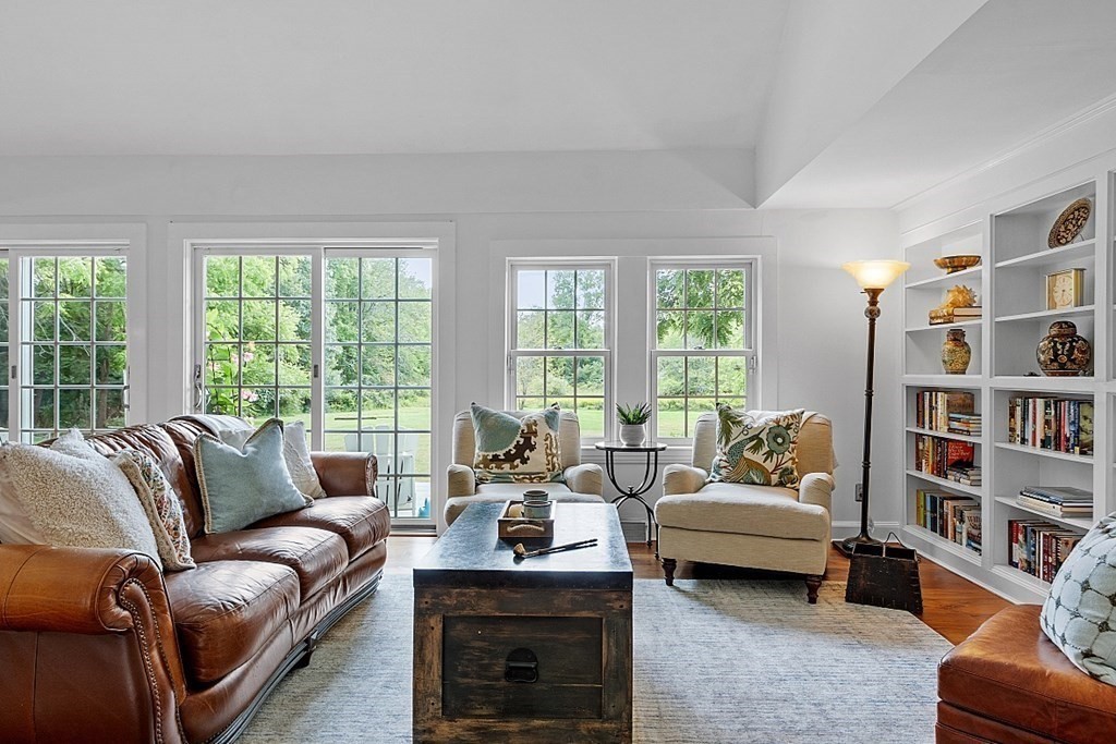 286 Lexington Road Concord, MA 01742 - Photo 9 of 41 a living room with furniture and a large window