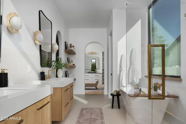 a view of living room kitchen and entryway