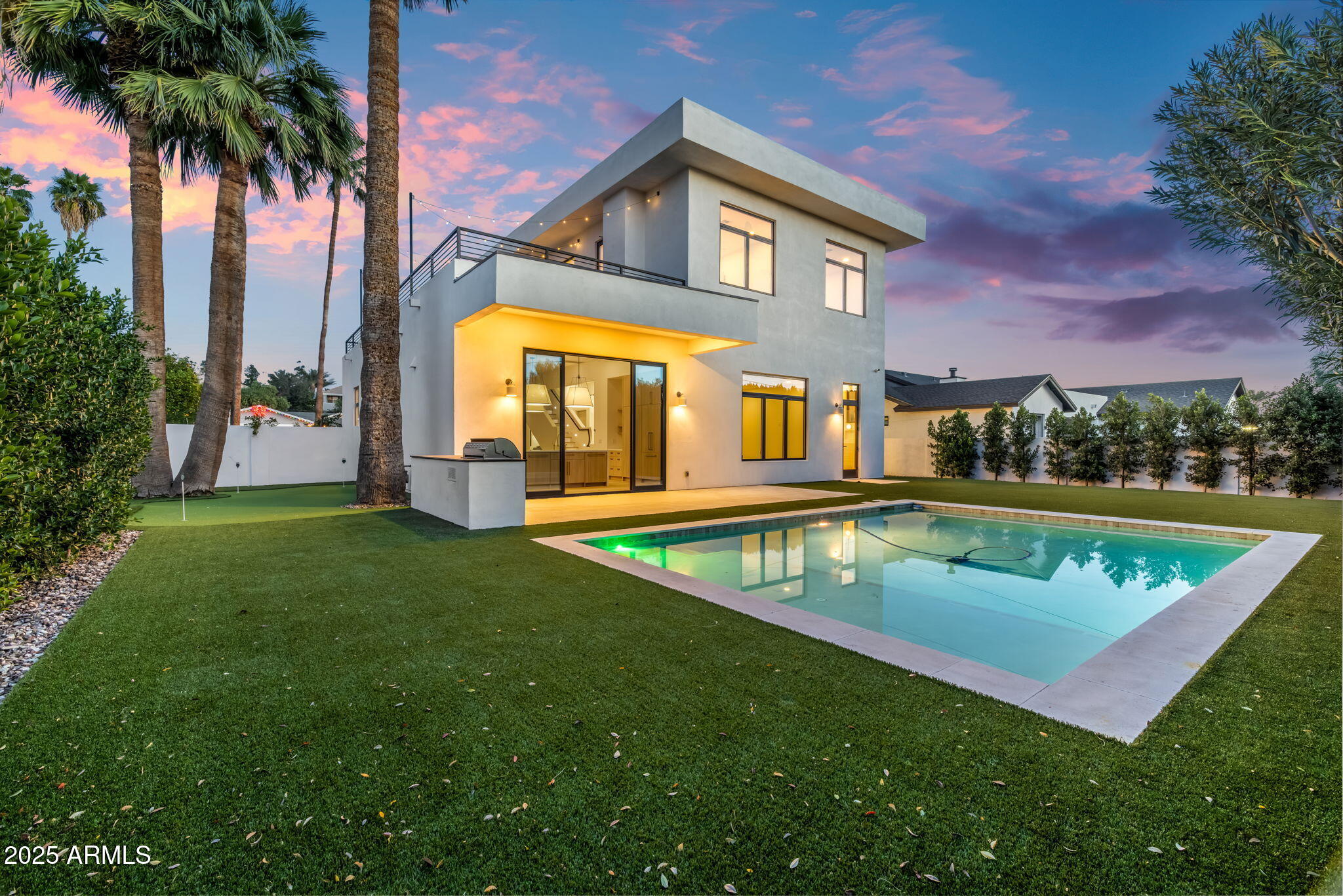 4120 North 44th Place Phoenix, AZ 85018 - Photo 36 of 40 Pool with baja shelf & putting green