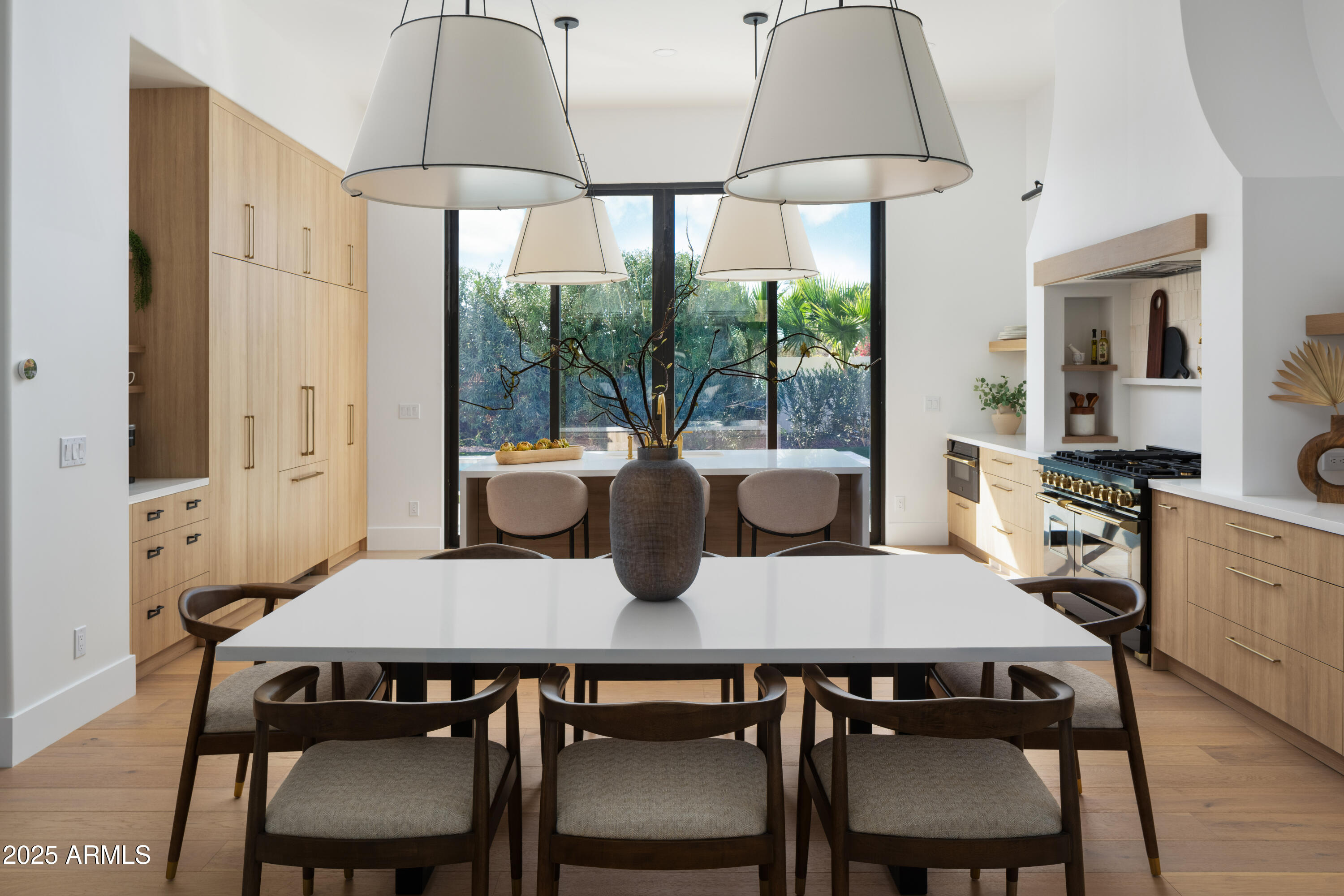 4120 North 44th Place Phoenix, AZ 85018 - Photo 7 of 40 a view of a dining room with furniture and window
