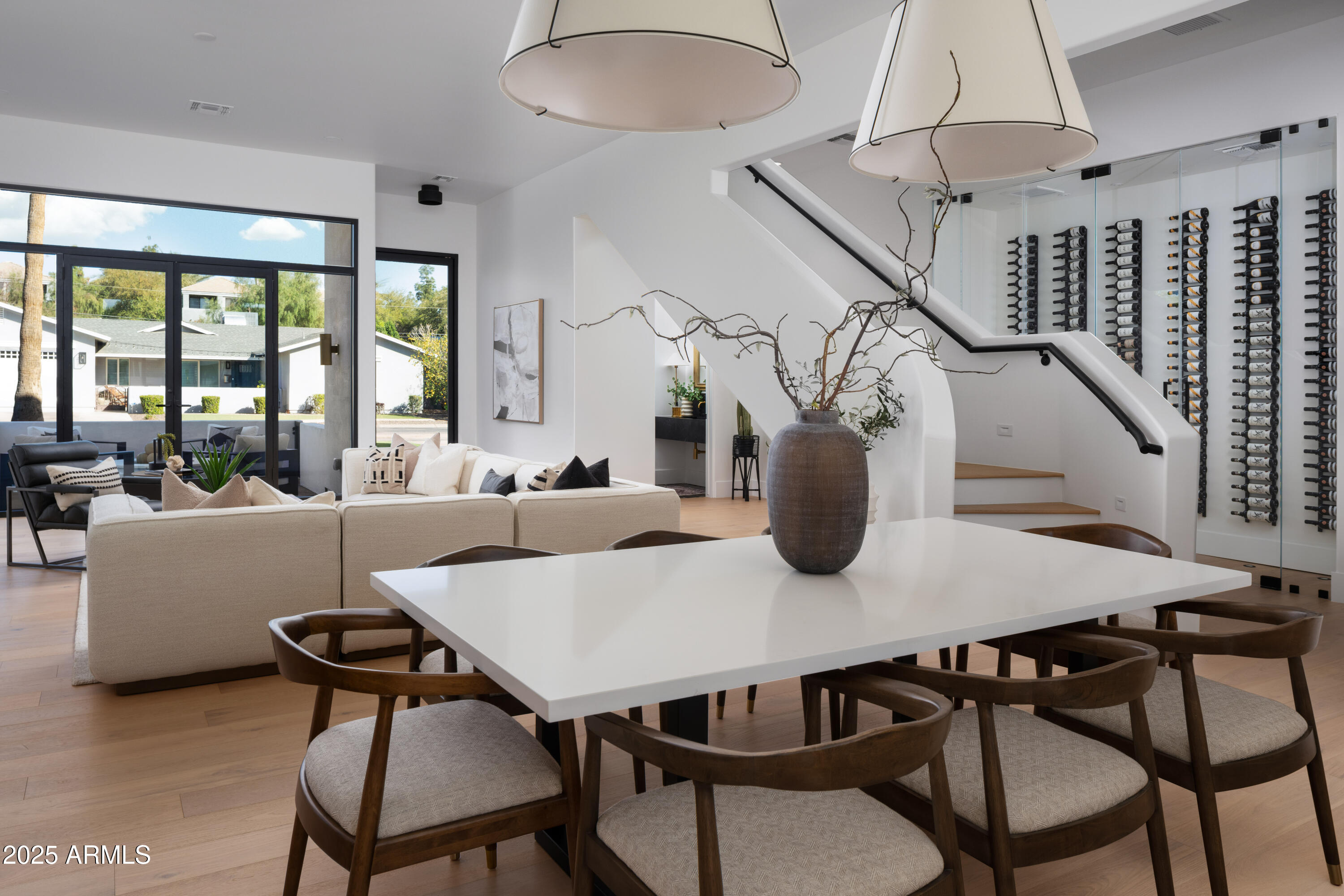 4120 North 44th Place Phoenix, AZ 85018 - Photo 9 of 40 a view of a dining room with furniture window and wooden floor