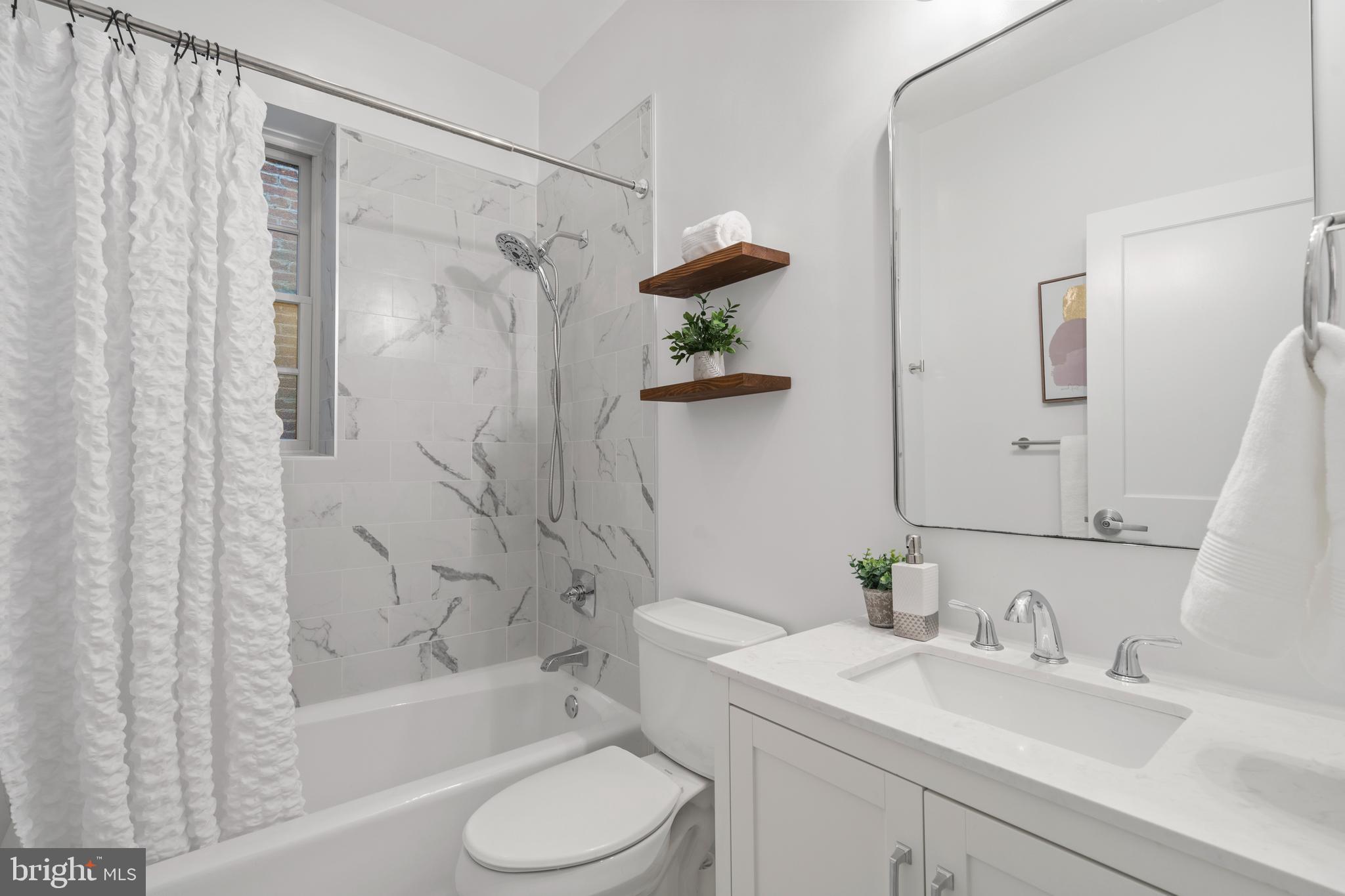 1111 M Street Northwest, Unit 7 Washington, DC 20005 - Photo 15 of 38 Hallway Full Bathroom