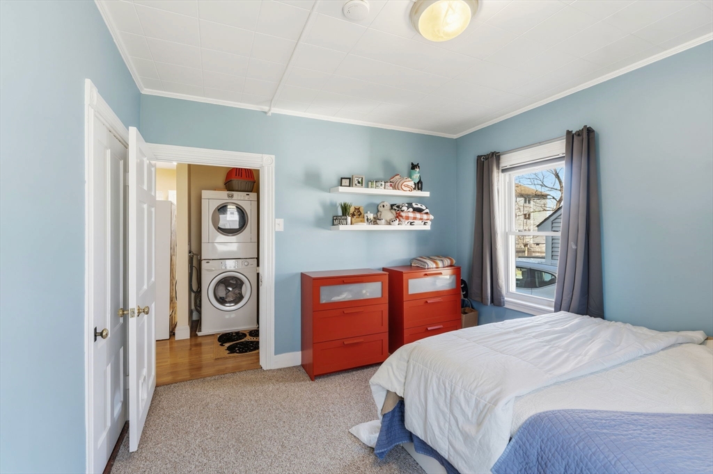 17 Cutler Street, Unit 1 Webster, MA 01570 - Photo 18 of 33 a bedroom with bed and cabinets