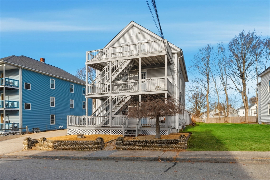 17 Cutler Street, Unit 1 Webster, MA 01570 - Photo 26 of 33 a glass building with trees in front of it