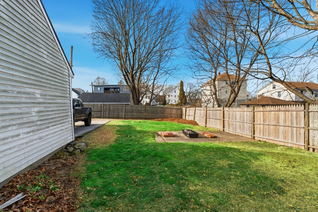 17 Cutler Street, Unit 1 Webster, MA 01570 - Photo 32 of 33 a view of a backyard with a garden