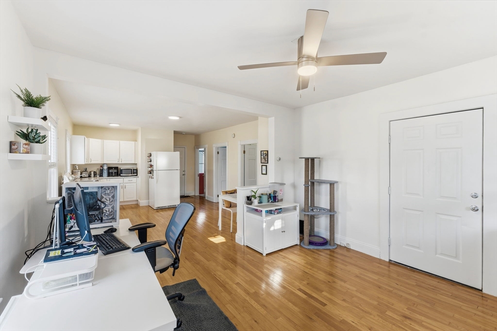 17 Cutler Street, Unit 1 Webster, MA 01570 - Photo 7 of 33 a living room with furniture a table and chairs