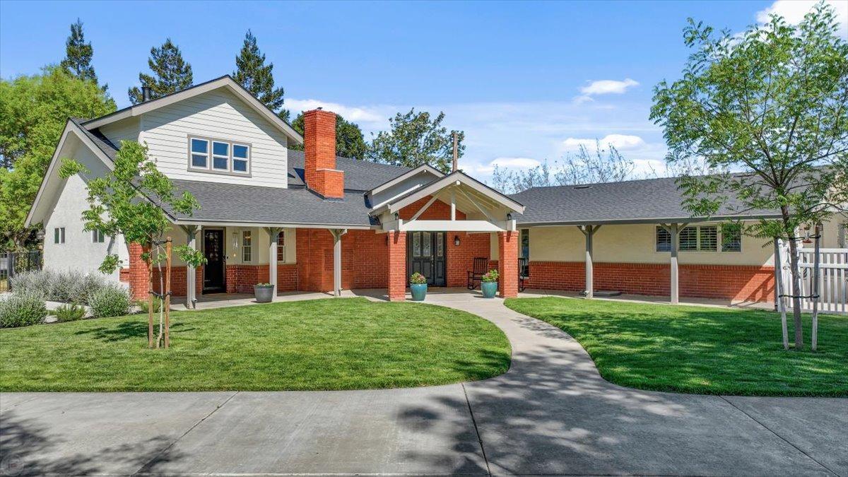 28100 South Bird Road Tracy, CA 95304 - Photo 1 of 1 a front view of a house with a yard and entertaining space