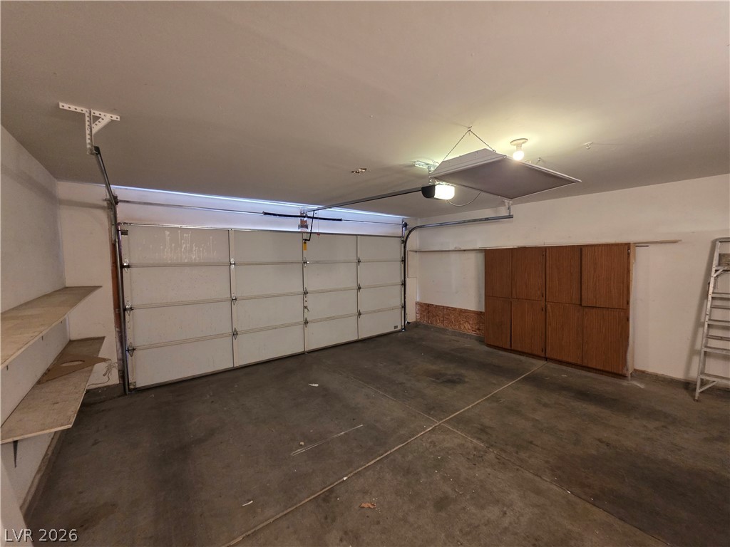 2275 Ramsgate Drive Henderson, NV 89074 - Photo 83 of 84 Functional garage with ample storage cabinetry and convenient access to attic space.