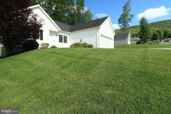 a view of outdoor space yard and front view of a house