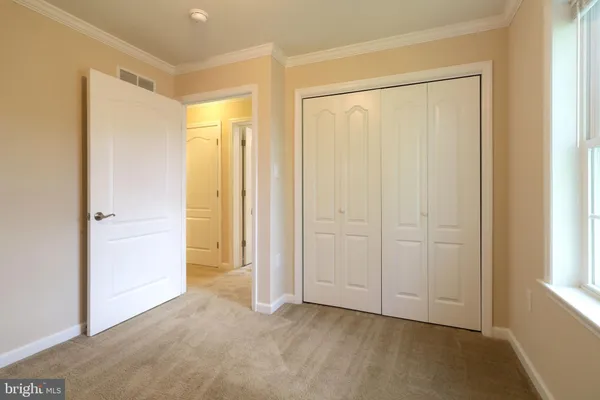 a view of an empty room with window